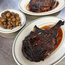 MM Shapley’s Restaurant signature dishes Cowboy RibeyeSeared TunaFilet Mignon
